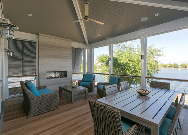 Back porch fireplace. Back porch features a modern outdoor fireplace with Ann Sacks Ontario Field Tile in Cream. Porch ceiling paint color is Sherwin Williams SW 7025 Backdrop. #Backporch #porch #fireplace #fireplacetile #modernoutdoorfireplace #AnnSacksOntarioFieldTile #SherwinWilliamsSW7025Backdrop