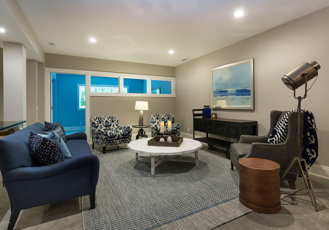 Basement Living room. Beautiful Basement Living room with blue and white decor and industrial accents. Basement Living room #BasementLivingroom #Basement #Livingroom