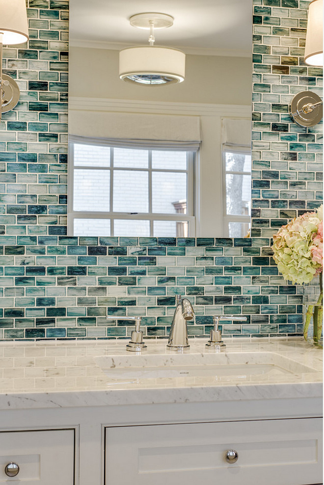 Bathroom wall accent. The wall tile is from Complete Tile Collection - Zumi Glass Tile. Bathroom with marble countertop and wall accent tile. Wall accent tile in bathroom. #Bathroom #AccentTilewall #Accentwall #Tilewall #tile #wall #tiling Redo