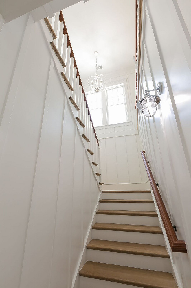 Batten and Board Staircase. Batten and Board Staircase Wall. The staircase features batten and board panels painted in Sherwin Williams Extra White. Trim Dimensions: 1x2 flat work every 18”. Batten and Board Staircase Wall Dimensions. #BattenandBoard #Staircase #BattenandBoardStaircase #StaircaseWall #Dimensions