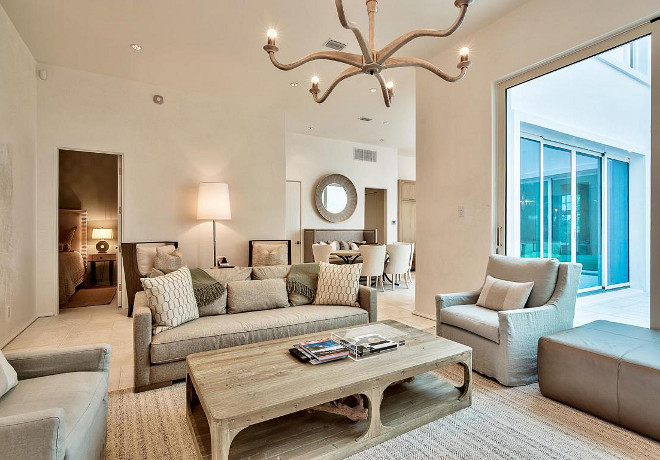 Family Room. Family Room Furniture, rug, lighting. I love the comfortable, casual furniture featured in the family room. Isn't this space inviting? #familyroom #rug #furniture #lighting Scenic Sotheby's Realty. Interiors by Jan Ware Designs.