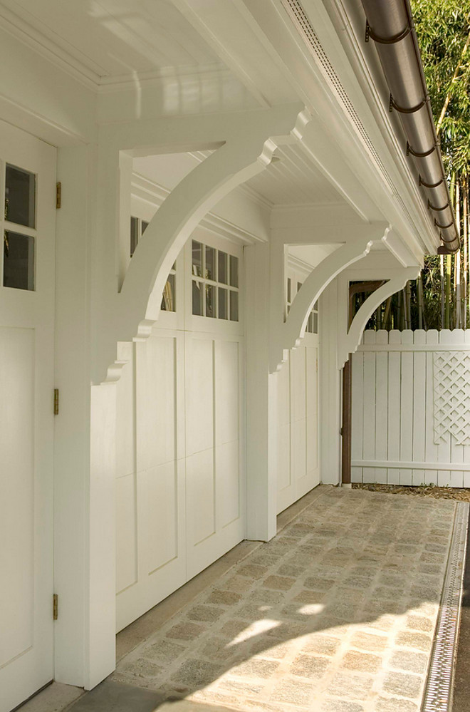 Garage Brackets. Garage doors are made by Artisan Doors, the Lexington Line and the Spanish cedar garage brackets, corbels and trims were custom designed by Lasley Brahaney Architecture + Construction