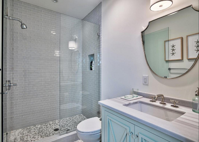 Glass Tile Shower. Beautiful gray glass subway tile bring some interest to this shower. #glasstile #gryaglasstile #graytile #shower Interiors by Jan Ware Designs.