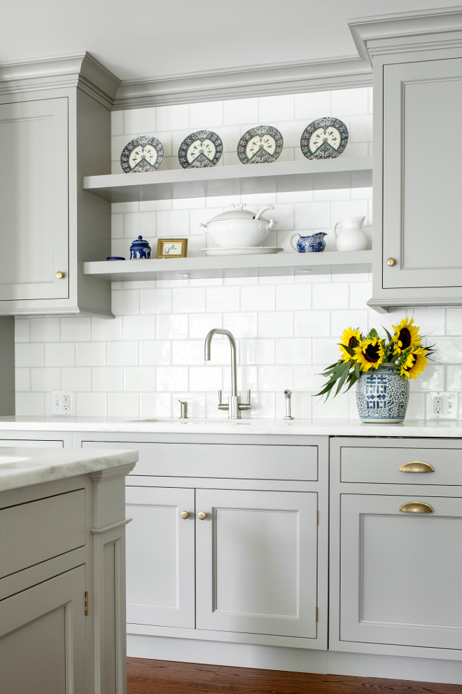 Open Shelved Between Cabinets. Open Shelves: Functioning as a feature element to the kitchen, the open shelves pick up design elements in the family room and breakfast areas thereby, better integrating the kitchen into the design as a whole. #Kitchen #openshelves #openshelvesbetweencabinets #shelves Heidi Piron Design.