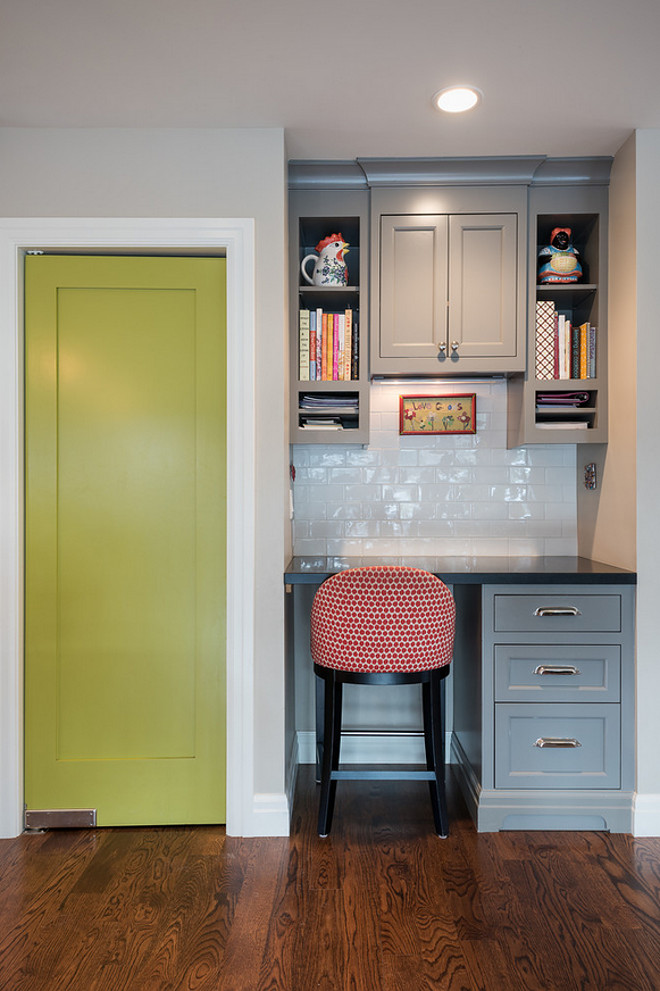Kitchen desk by pantry. Kitchen desk by pantry with door painted in a similar color Benjamin Moore Chic Lime. #kitchen #desk #kitchendesk #pantrydoor #pantry #BenjaminMooreChicLime Northstar Builders, Inc.