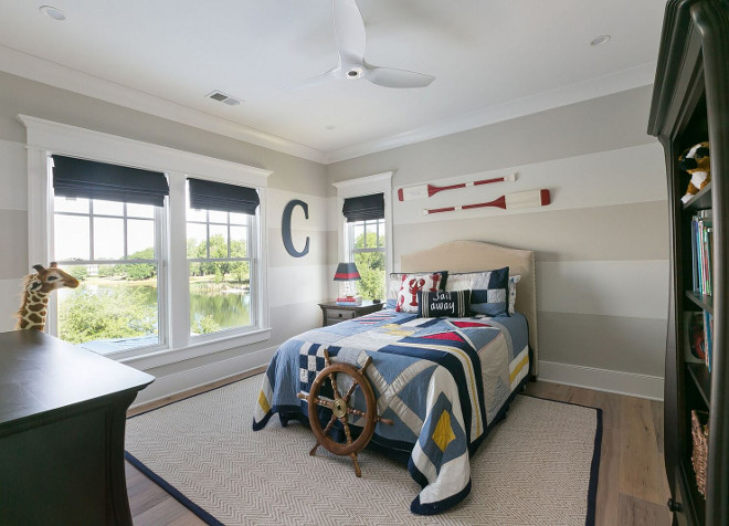 Large wall stripes. Bedroom with large stripes painted on walls. Large wall stripes paint color is Sherwin Williams Anew Gray and Sherwin Williams Creamy striped. The Guest House Studio