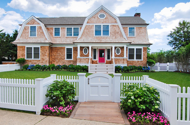 Shingle home with white picket fence. If this doesn't scream curb appeal I am not sure what else does. Dearborn Builders.