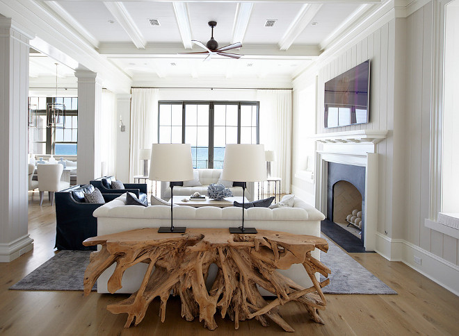 Sofa table. Coastal living room with driftwood console, sofa table. #Sofatable #consoletable #driftwood #driftwoodtable #livingroom TS Adams Studio Architects. Laura Allyson Interiors.