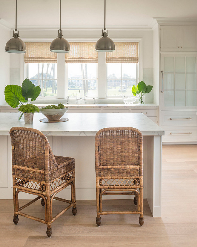 Wicker counterstools. Neutral kitchen with antique wicher counter stools. Wicker kitchen stools and bamboo shades bring some natural texture to this neutral kitchen #neutralkitchen #whickerstools #whickercounterstools #whicker #counterstools Phoebe Howard. Jessie Preza Photography. 