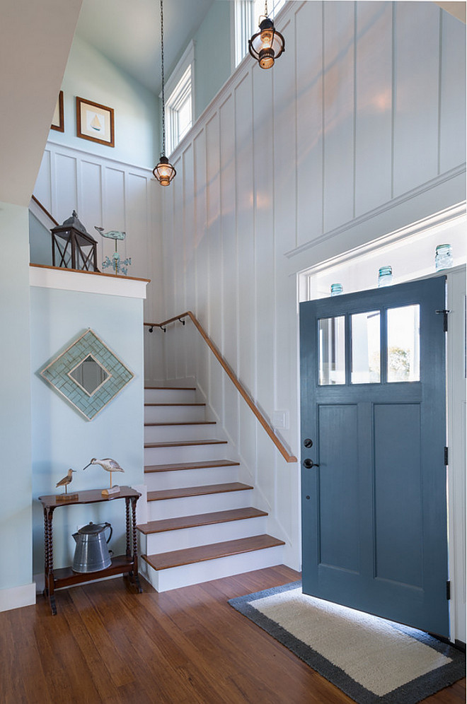 Board and batten foyer. A foyer with board and batten walls, painted in "Benjamin Moore OC-17 White Dove", immediately makes you feel welcome and relaxed. Board and batten foyer wall. Board and batten foyer accent wall. Board and batten foyer staircase. #Boardandbatten #foyer #Boardandbattenwall #Boardandbattenfoyer #Boardandbattenstaircase