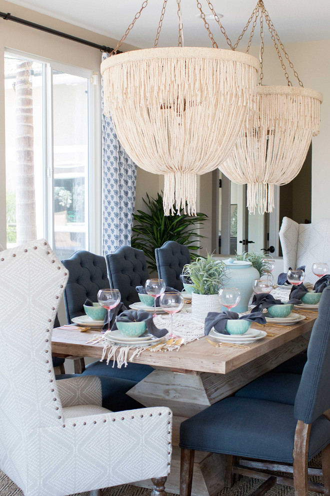 Dining room lighting. Dining room lighting. Made Goods Carmen Chandelier. Coco beads are loosely draped and gathered in this glamorous chandelier. Accented with sparkly clear beads. #DiningRoom #Lighting #Carmen #Chandelier #MadeGoods Blackband Design