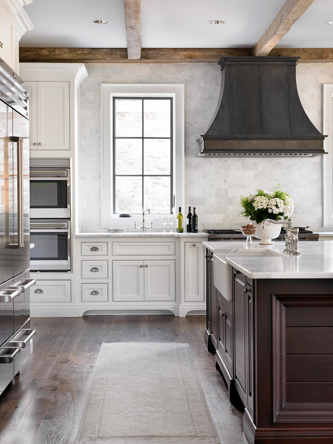 French Country kitchen with reclaimed wood beams and zinc French kitchen hood. Beautiful French Country kitchen with reclaimed wood beams and zinc French kitchen hood #FrenchCountry #kitchen #FrenchCountrykitchen #reclaimedwood #beams #zincFrenchhood #kitchenhood L. Kae Interiors