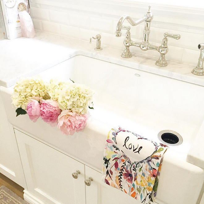 Kitchen sink decor. Peonies and dish towel from Anthropologie. #kicthen #sink jshomedesign