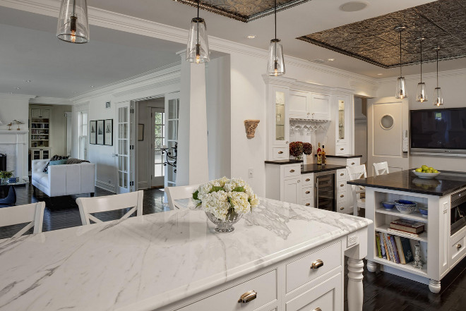 Kitchen with double islands. Calcutta gold marble and Maroon cohiba antique granite are used as countertop in this kitchen with double islands. Jane Kelly, Kitchen and Bath Designer