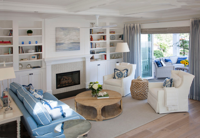 Living Room. Blue and white decor in coastal living room. Living room. Coastal Living Room white and blue decor. #Livingroom #coastallivingroom #blueandwhitedecor #decor Flagg Coastal Homes