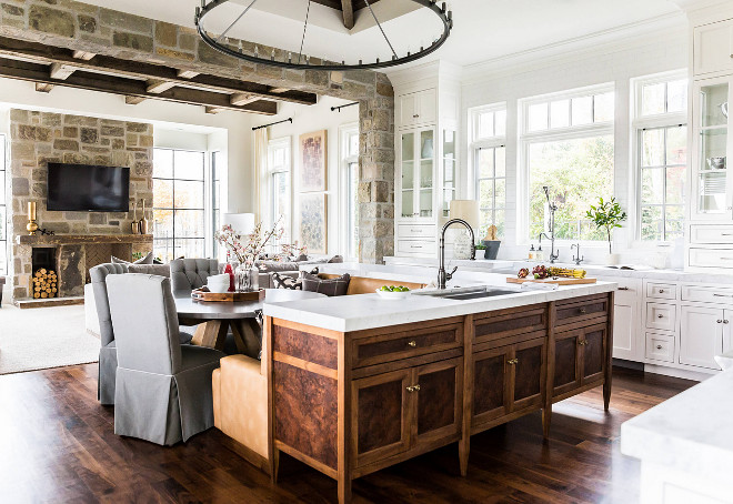 The Kitchen cabinetry was designed to embrace the natural light in Bespoke white style, countered by the natural burled Maple & Walnut island - designed in the inlaid 'Biedermeier' tradition - to give added warmth to the leather banquette. Hyrum McKay Bates Design, Inc.