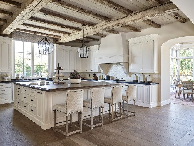 Traditional kitchen with rustic reclaimed ceiling beams. Traditional white kitchen with rustic reclaimed ceiling beams. Traditional kitchen with rustic reclaimed wood ceiling beams #Traditionalkitchen #kitchen #rustic #reclaimedwood #ceilingbeams #reclaimedbeams Candelaria Design Associates