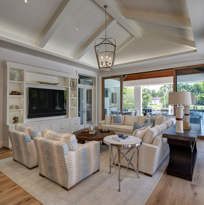 Vaulted shiplap ceiling. Transitional coastal living room with vaulted shiplap ceiling. Beautiful Transitional coastal living room with vaulted shiplap ceiling. #Transitionallivingroom #coastallivingroom #vaultedceiling #shiplapceiling #shiplap W Design Interiors