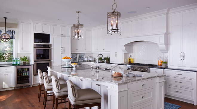 White kitchen. This white kitchen features a timeless design that will stand the test of time. The backsplash is custom hand-made crackle tiles from Sonoma Tile Makers. #kitchen #whitekitchen Vivid Interior Design. Hendel Homes
