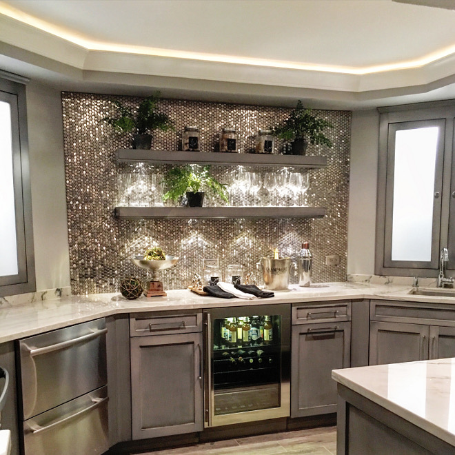 Basement Bar Open Shelves. Kitchenette Backsplash: Brushed Chromium Penny Tile with a porcelain backing by SomerTile. Floating shelves on basement bar Beautiful Homes of Instagram Sumhouse_Sumwear