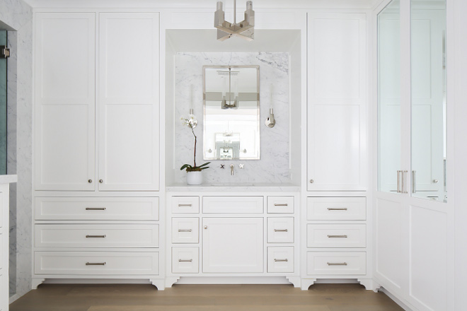 Bathroom floor to ceiling cabinet. Walls of built-in cabinet add beauty and lots of storage space to this bathroom. Cabinets are flush inset cabinet frames with inset drawer and door fronts and furniture toe kick trim. #bathroom #cabinet #bathroomcabinet Winkle Custom Homes. Melissa Morgan Design. Ryan Garvin Photography