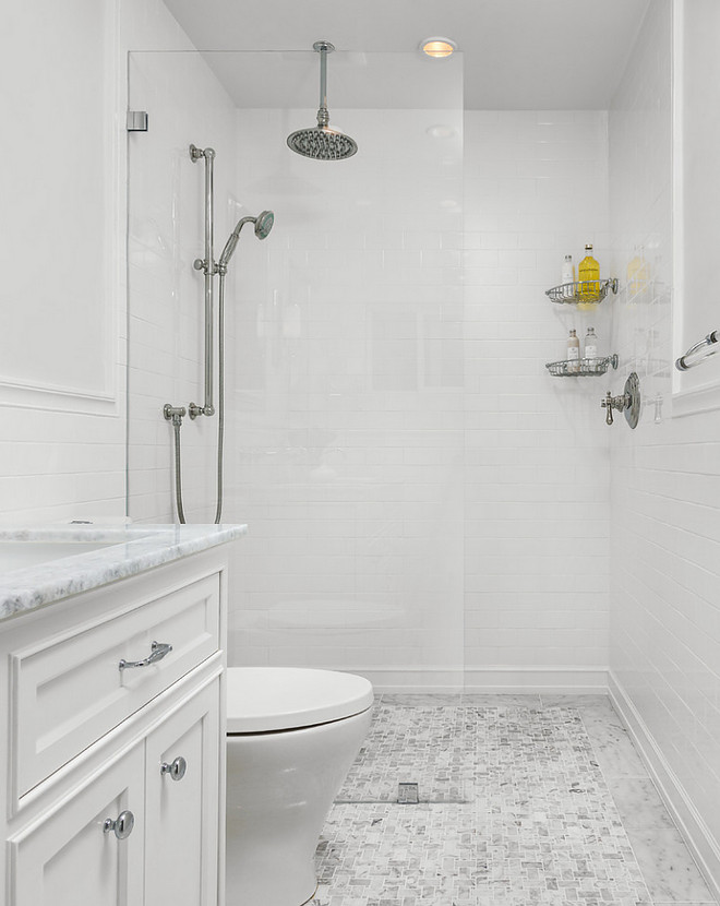 Bathroom wall tile, Bathroom floor tile, bathroom shower tile. Timeless Bathroom Tile Combination. Flooring Tile: The perimeter border tile used in this bath project was a polished 4" x 12" statuary marble paver. Then, the designer used white statuary marble in a basketweave format for the tile mosaic inset; the grout used was Customblend Bright White. Wall Tile: The tiles used on the walls is Sonoma Tilemakers Pure Collection. Robert Frank Interiors. Clark Dugger Photography