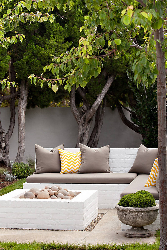 Brick Outdoor furniture and fireplace. The brick bench is a simple block construction with a brick veneer. Molly Wood Garden Design