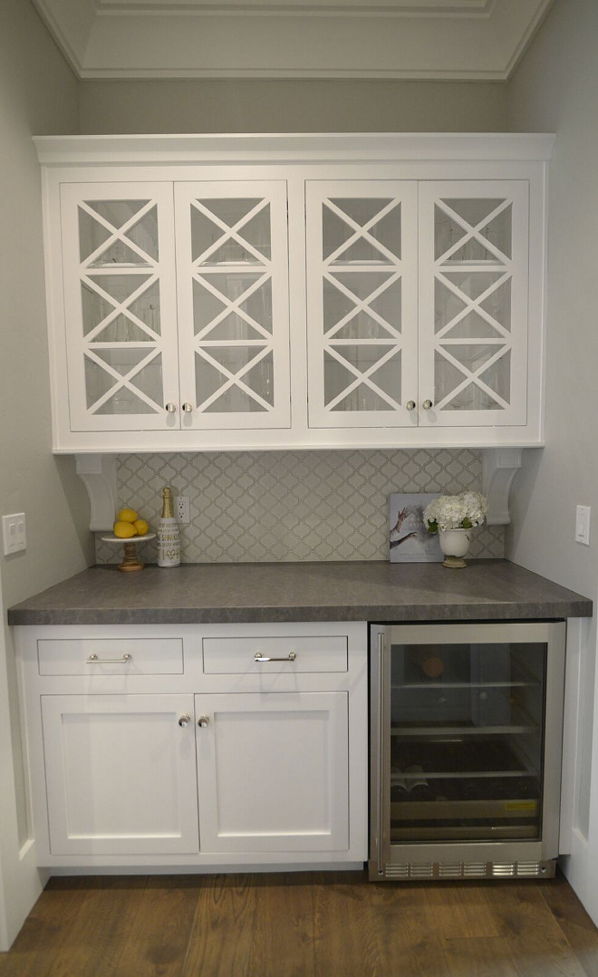"X-mullion" cabinet doors and gray countertop creates a timeless look to this small, but very functional, butler's pantry. Countertop is Euro Stone K work Grain. #butlerspantry #cabinet #xmullion #xmullioncabinetdoor butler-pantry Eye for the Pretty