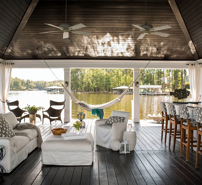 Covered Dock. Party dock. Spacious covered dock, pavilion style dock with outdoor kitchen and outdoor living area. #Dock #CoveredDock #pavilion #partydock Heather Garrett Design