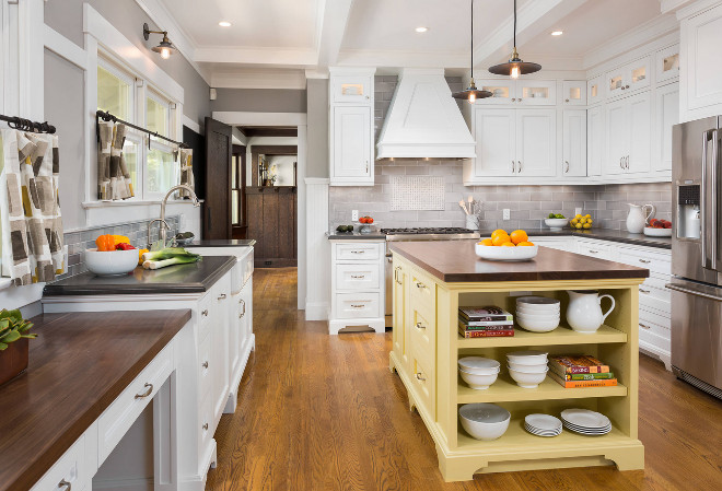 Craftsman Kitchen. Craftsman Kitchen Renovation. Our goal was to redesign, refresh, and update a family kitchen within the design aesthetic of this original 1909 Craftsman home in South Pasadena. Careful attention was given to the finish choices and use of custom white lacquered inset cabinetry gave the space an open and light feeling. Craftsman Kitchen Paint Color Combination: Benjamin Moore Ozark Shadows (AC-26) was used on the walls and the island was lacquered in Benjamin Moore Goldfield (292). The cabinetry and ceiling color is Benjamin Moore Super White (PM-1). #CraftsmanKitchen #Craftsman #Kitchen #CraftsmanKitchenDesign Robert Frank Interiors. Clark Dugger Photography