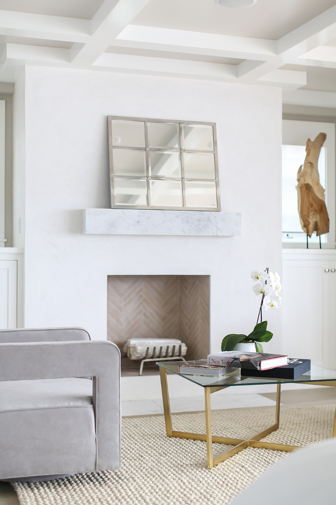 Fireplace Marble mantle. Fireplace features a Floating marble box mantle. The master bedroom fireplace features a floating marble box mantle. #fireplace #mantle #floatingmantle #floatingmarblemantle #floatingmarbleboxmantle Winkle Custom Homes. Melissa Morgan Design. Ryan Garvin Photography