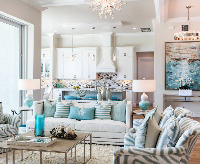 Living room color palette. The color palette of this living room includes blues, aquas and natural browns accented by metallic silvers and grays - soft, cool tones that subtly change from room to room just as the Gulf Coast waters change from morning to night. Living room color palette ideas. Living room color palette #Livingroom #colorpalette