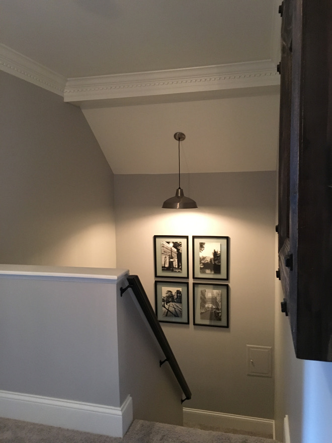 Grey paint color with white trim. Grey wall paint color is Metro Gray Benjamin Moore. White Trim paint color isWhite in Satin Finish By Benjamin Moore