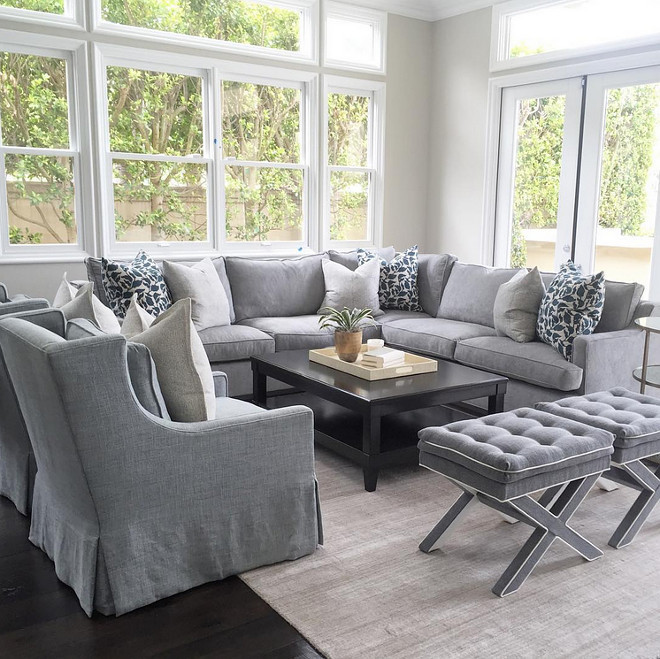 Grey sofa sectional with grey chairs and grey benches. Living room with Grey sofa sectional with grey chairs and grey benches. #livingroom #Greysofa #Greysectional #greychairs #greybenches Brooke Wagner Design
