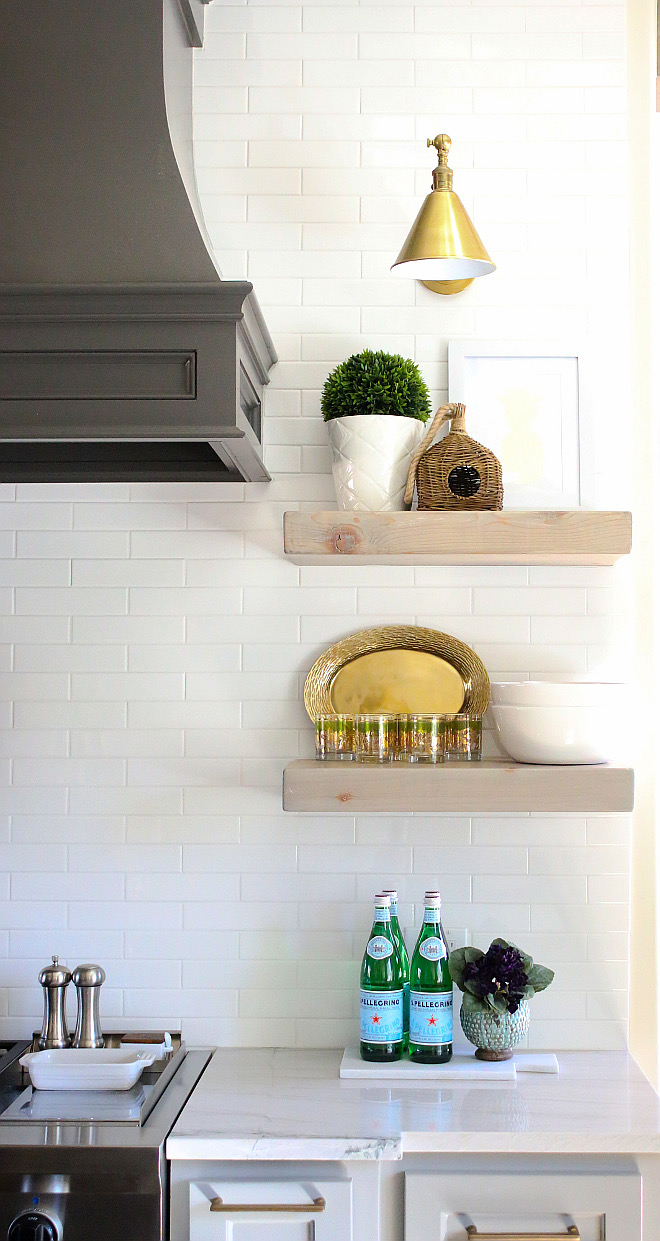 Kitchen Floating Shelves. Open shelving by kitchen hood are reclaimed floating shelves from Renaissance Wood in OKC, OK. kitchen-small-shelves Kitchen Floating Shelves #Kitchen #FloatingShelves #reclaimedshelves #reclaimedopenshelves Home Bunch's Beautiful Homes of Instagram curlsandcashmere