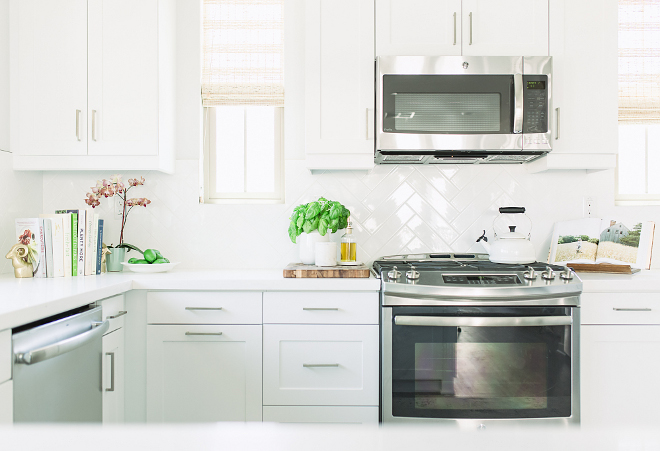Backsplash is white herringbone subway tile with white grout. Appliances are by GE. kitchen-appliances-affordable-kitchen-appliances-kitchen-appliances-are-by-ge-kitchenappliances-appliances-affordablekitchenappliances