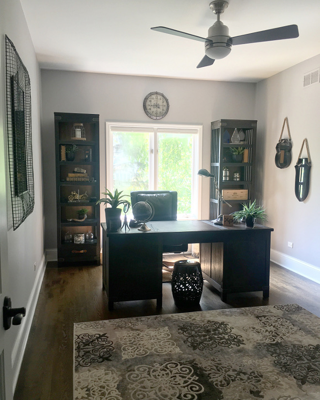 Masculine Vintage style Home Office. The theme of this space was to be vintage and masculine. The theme of this space was to be vintage and masculine. My challenge was bringing in light, because my husband wanted dark furniture. I used a light colored rug with dark accents and mirrors to help brighten the room. Wall Paint: Benjamin Moore Metro Gray all furniture: Arhaus Furniture Rug: Homegoods #homeoffice #masculinehomeoffice Beautiful Homes of Instagram Sumhouse_Sumwear 