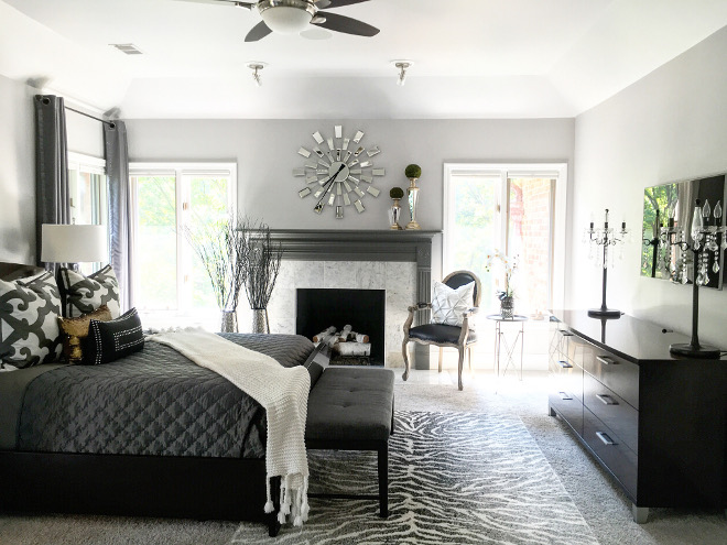 Master Bedroom Fireplace. Benjamin Moore Kendall Charcoal in High Gloss. Fireplace Paint Color: Benjamin Moore Kendall Charcoal in High Gloss Finish and Carrara Marble. #BenjaminMooreKendallCharcoal #highgloss Beautiful Homes of Instagram Sumhouse_Sumwear