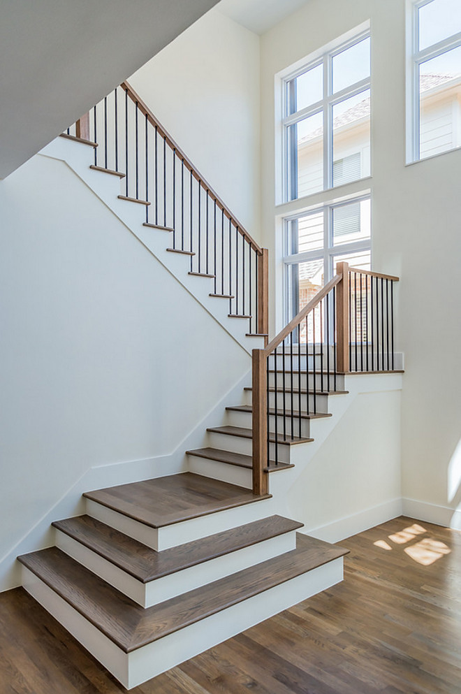 Open entry with white oak hardwood flooring and hardwood stair treads. Hardwood Stair Treads. Open entry with white oak hardwood flooring and hardwood stair treads. White oak hardwood stair treads. #hardwood #stairtreads Tanner Homes & Tiper Residential Development.