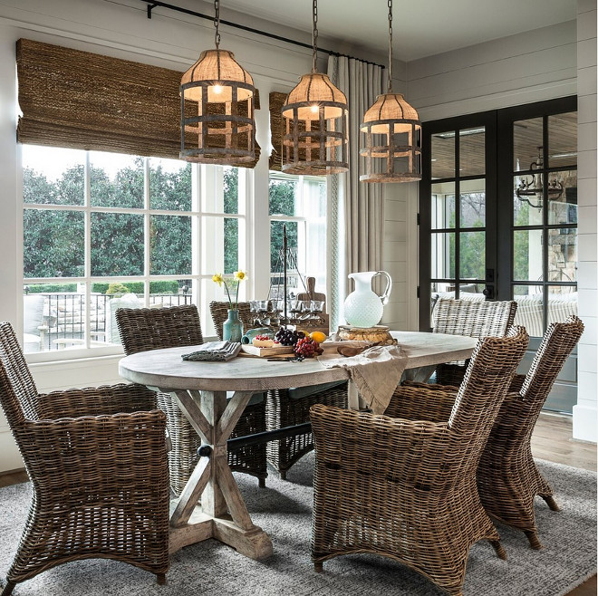 Rattan Dining Chair and woven roman shades. Rustic farmhouse dining room with Rattan Dining Chair and woven roman shades. Rattan Dining Chairs. #Rattan #DiningChair #wovenshades #wovenromanshades