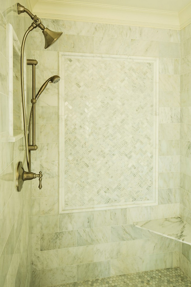 Shower tiling is Carrara Marble cut into different sizes/patterns. Carrara marble shower tile. Shower tiling is Carrara Marble. #Shower #tiling ##Showertiling #CarraraMarble Hendel Homes. shower-tiling
