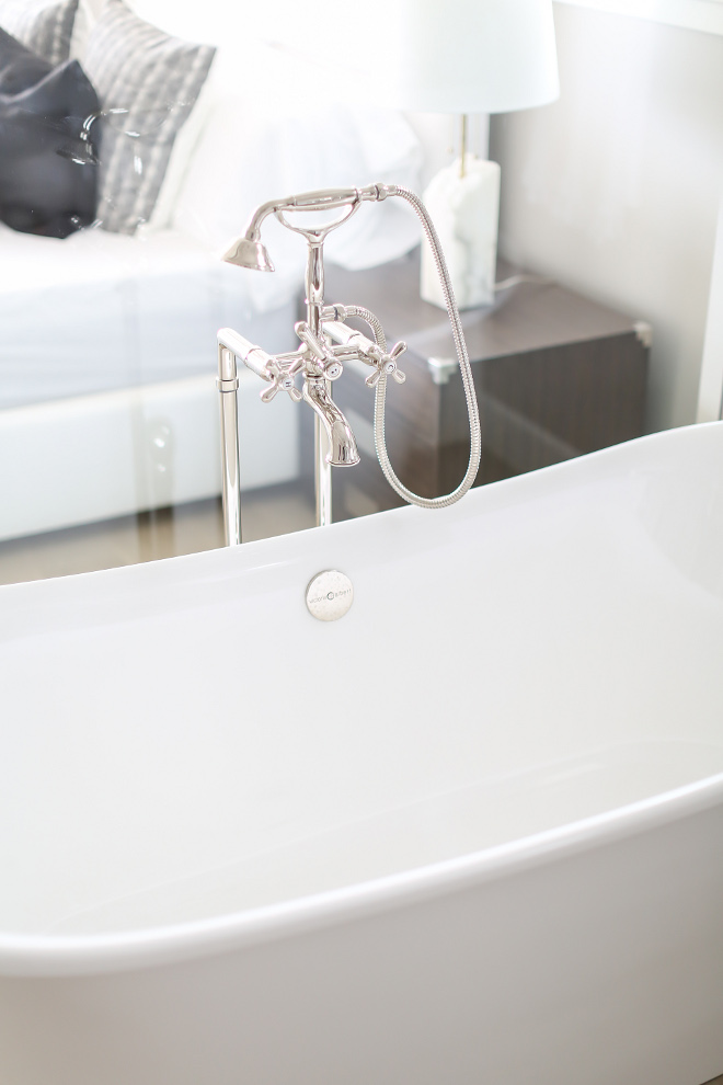 Tub Filler. Master tub is by Victoria + Albert. Tub filler is by Rohl. Winkle Custom Homes. Melissa Morgan Design. Ryan Garvin Photography