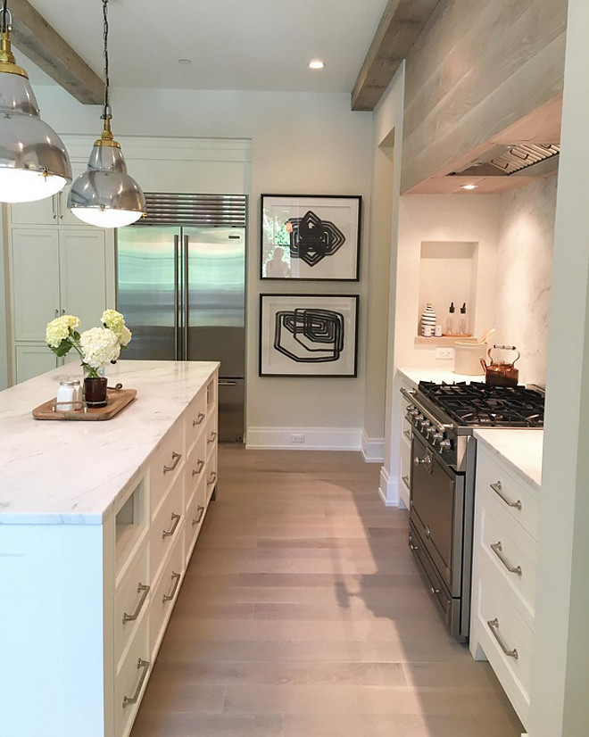Cabinet paint color is Benjamin Moore OC-17 White Dove. Floors are 6" white oak floors. white-dove-by-benjamin-moore-kitchen-white-oak-hardwood-floor-and-limewashed-wood-kitchen-hood Kate Marker Interiors