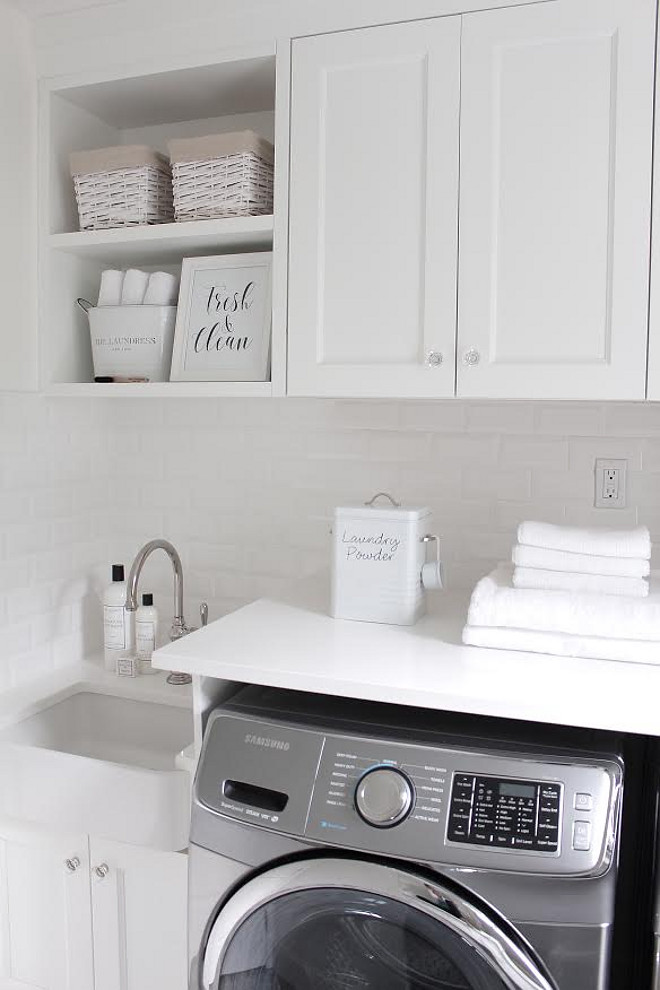 white-laundry-room-with-grey-washer-and-dryer JShomedesign via Instagram. 