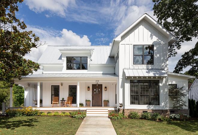 White farmhouse with board and batten exterior and metal roof. White farmhouse front porch. White exterior. White farmhouse with board and batten exterior and metal roof. #Whitefarmhouse #White #farmhouse #frontporch #farmhousefrontporch #farmhouseporch #Whiteexterior #battenandboard #battenandboardexterior J Taylor Designs