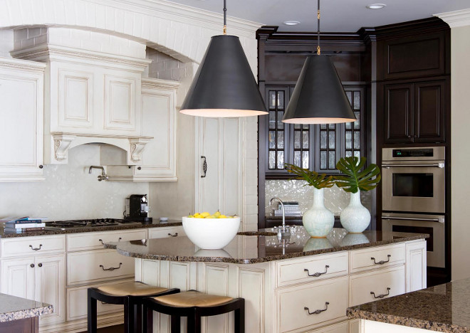 White ivory kitchen cabinet paint color. white-ivory-kitchen-and-dark-stained-wet-bar-cabinet-white-ivory-kitchen-and-dark-stained-wet-bar-cabinet-paint-color #Whiteivorykitchen #darkstainedcabinet #wetbar #cabinet #kitchen Beautiful Homes of Instagram