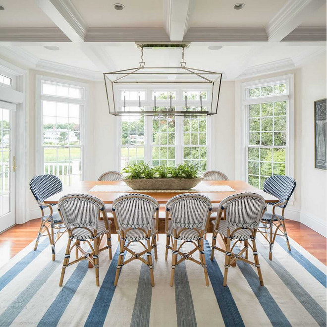 Darlana linear chandelier. This coastal dining area features a Darlana Linear Chandelier from Visual Comfort and bistro chairs from Serena & Lily. #DarlanaLinearChandelier #Darlana #linearChandelier #VisualComfort darlana-linear-chandelier-from-visual-comfort Design № Five