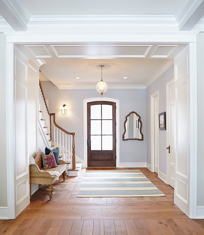 Entry. Entry decor. Entry bench. Entry flooring. Entry millwork. Entry lighting. Lighting is from Hinkley. Sconces are Visual Comfort Eric Cohler Venetian 2 Light Sconce in Hand-rubbed antique brass. #Entry entry Hendel Homes