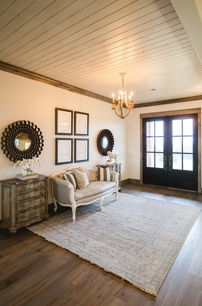 Farmhouse Foyer. Farmhouse Foyer with tongue and groove ceiling and black front doors. #Farmhouse #Foyer #FarmhouseFoyer #Tongueandgroove #ceiling #Blackdoor Alicia Zupan