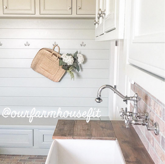 Farmhouse laundry room mudroom. Farmhouse laundry room mudroom with reclaimed plank countertop, shiplap walls and brick flooring. #Farmhouse #Farmhouselaundryroom #Farmhousemudroom #reclaimedplank #countertop #shiplap #brick #flooring farmhouse-laundry-room-mudroom Home Bunch's Beautiful Homes of Instagram ourfarmhousefit